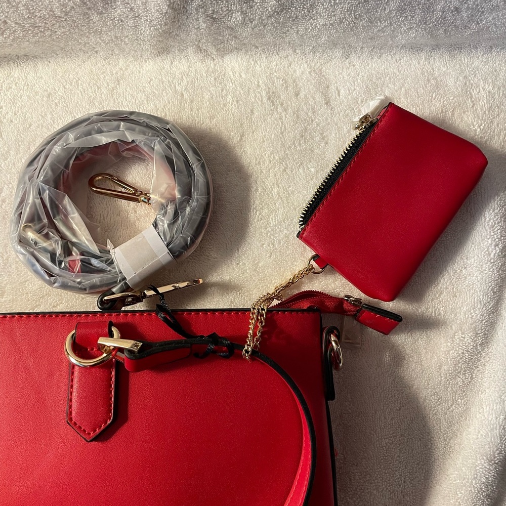 La Terre purse with long strap and coin purse.